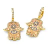 Pink Enamel Hamsa Huggies in Yellow Gold